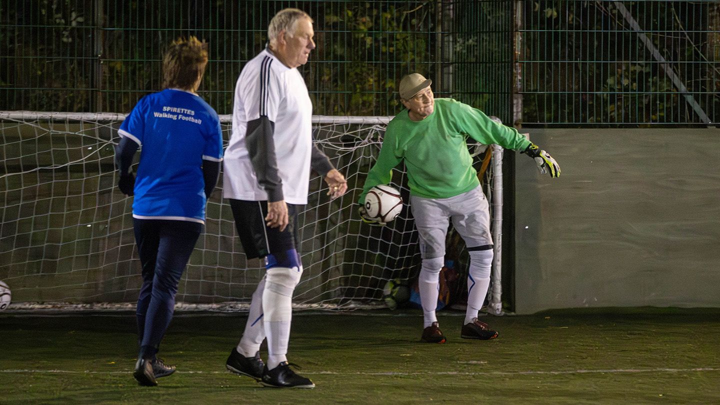 A shot of Senior Spireites FC's goalkeeper about the throw the ball to one of his teammates during a friendly fixture against the Spirettes.