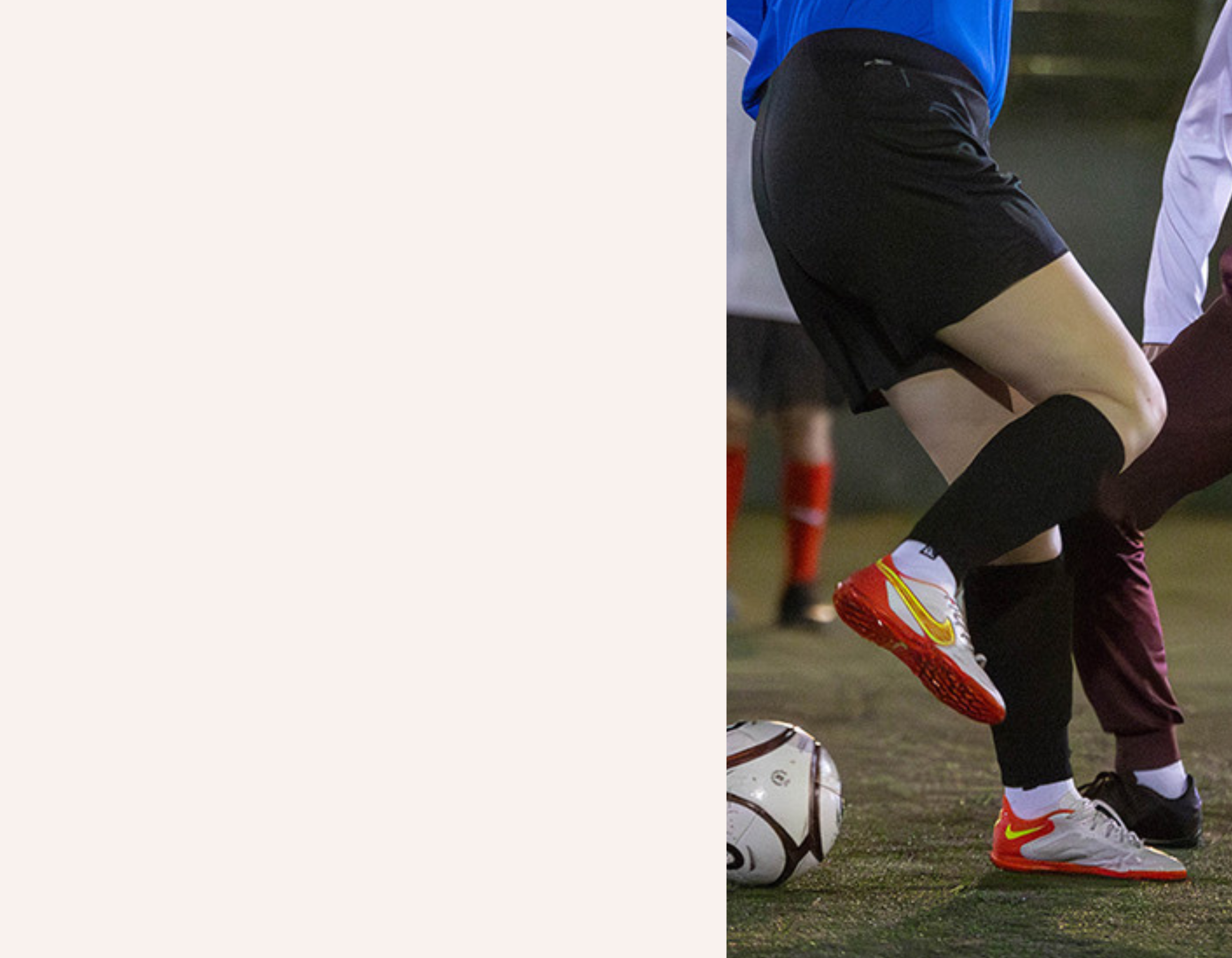 A low shot of two elderly people participating in walking football.